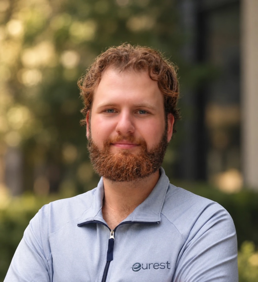 Russell Wagner in a Eurest quarter-zip, outdoors